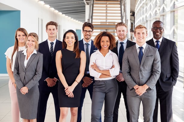 Graduate lawyers with their mentors 